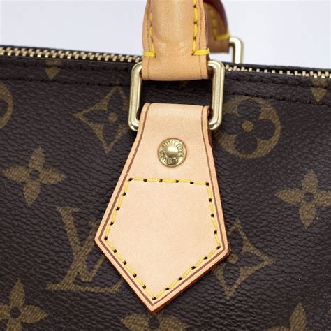 authentication of louis vuitton hardware.